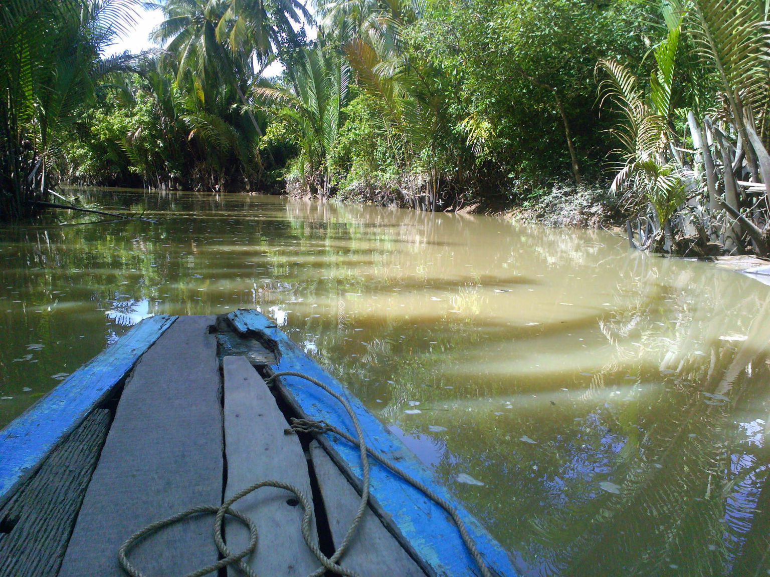 On the smaller boat