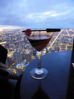 Photo of Hancock Tower Godiva chocolate martini and view of Chicago from the 96th floor of the Hancock Tower. Doesn't get any better than this. , Patricia J G - November 2012