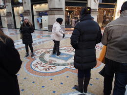 Photo of A quick stop in the Galleria Taking a and quot;spin and quot; on the bull for a year of good luck! , Jason V - December 2013