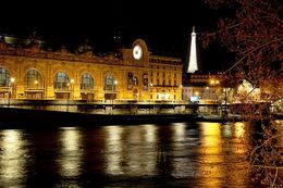 Photo of Shooting across the Seine toward the Orsay and Eiffel Tower The Orsay Museum is in the foreground with the Eiffel Tower in the background. William helped me with this timed exposure, shooting between tour boats going up and down the river changing the ... , Joe M - May 2016