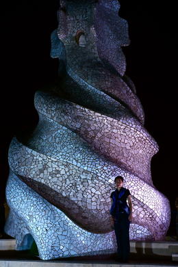 Photo of Mosaic ceramic coil towers like some huge bloom. My wife Junko pauses in the strange forest of chimneys. , george J - October 2013