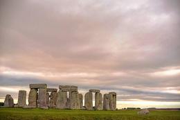 Photo of Stonehenge on a cloudy summer day Though it rained a little that day, we were still able to take great photos of this famous place. I think any season or weather will still give amazing views of stonehenge. , Arlene H - September 2016