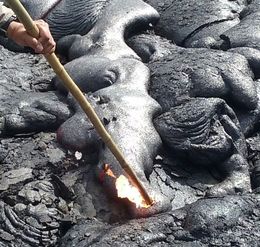 Photo of FIRE STICKS This is a photo of live lava, stick it with a stick and see it burn... Live flows are called break outs points where the lava is active and moving. I stayed over on the Kona side of the big ... , David J - July 2016