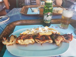 Photo of Lunch time! Calamari Souvlaki with fries and a beer- Captain John's restaurant, Thirassia , Rachel C - August 2016