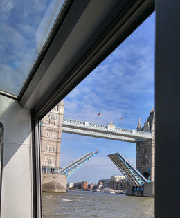 Photo of Tower Bridge rising up We got lucky on the boat cruise to watch the Tower Bridge rise up. So cool! , Katherine M - July 2016