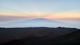 Photo of Mauna Kea summit shadow. From the top of Mauna Kea, this is the mountain's shadow falling on the clouds below. , Michael H - August 2016