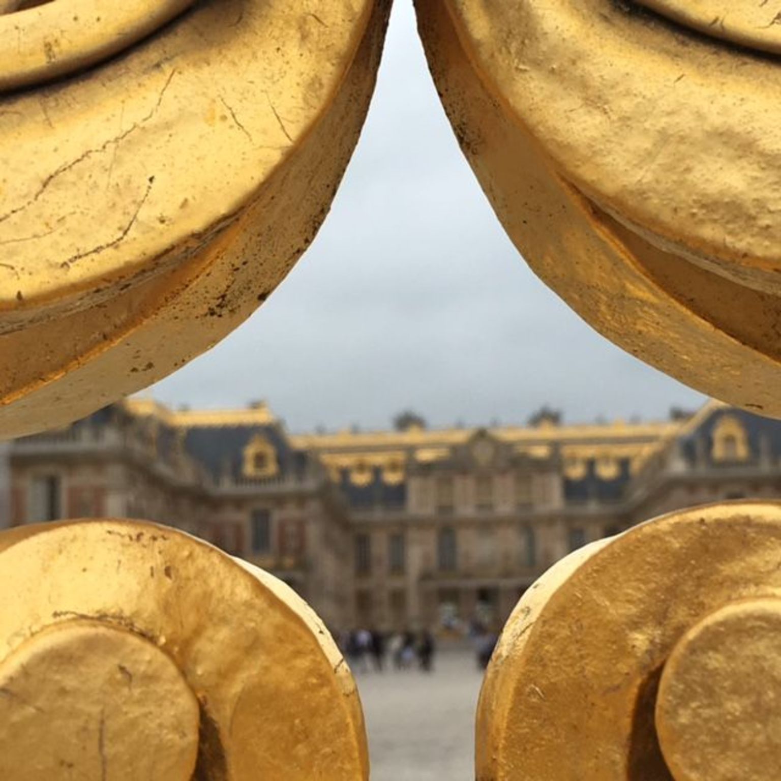 A view of Versailles through the golden gate