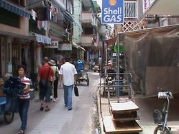 Photo of Another narrow shopping street Another typical street view where a number of shops catering to locals needs exist., Allan Smales - August 2009