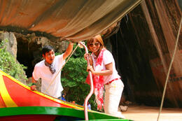 Photo of Casting Off One of our tour guides gets a hand from a passenger as we cast off from Phi Phi. , ROD C - September 2012