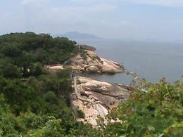 Photo of View from near the so-called pirates cave Part of the tour involves a short "Chinese junk" trip across the typhoon shelter to an island outcrop where the pirates cave is located. Once off the junk, there is a 5-10 minute walk up over ... , Allan Smales - August 2009
