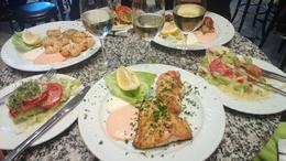 Photo of Lunch at Fischkutter in KaDeWe Delicious fischmeal, Jacobsmuschlen, King prawn and Steinbeisfilet enjoyed with cold white wine. , Michael H - May 2013