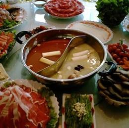 Photo of Hot Pot Yummy hotpot! The red portion is the spicy broth and the other one is not - May 2012