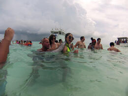 Photo of Stingray back massage With our host who is letting the stingrays give us a back massage , versasaurus - September 2014