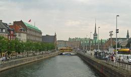 Photo of A typical vista A beautiful vista, taken from a bridge over one of the numerous canals and featuring a tourist canal boat as well as the less attractive heavy traffic. Note the magnificent buildings and the unique ... , Roddy K - August 2010