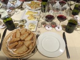Photo of Our First Wine Tasting of the Tour This was our first wine tasting at a villa owned by Italian nobility! One white, two Chianti Classicos, two local honeys, olive oil and bread. , Vera B - August 2016