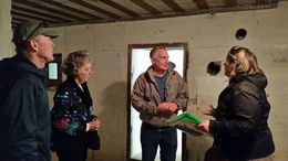 Photo of Inside a Point-du-Hoc German bunker Ann-Sophia, our guide, explaining about the WWII bunkers to Jim Houghton and Connie Nelson, who's father was part of the D-Day operation and Connie's husband Bill. , Judy H - October 2015