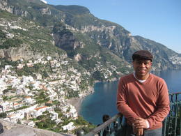 Photo of Positano Photo of me at a stop before arriving in Positano. Beautiful town with nice quaint shops. The group lunch at the beach restaurant was great. , Abdiel S - November 2011