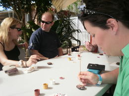Photo of Painting our matchbox seeds I am in the foreground hard at work as I paint my matchbox seed at Janbal. , Laura B - August 2013