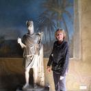 Dori standing with an Egyptian statue at the Vatican Museum - Photo by: Daniel C, USA