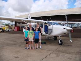 Photo of Family Pre-takeoff The kids loved the flight - the smooth takeoff/landing, the views of Waimea Canyon, Na Pali coast, and the lush green volcanic slopes., Ian A - April 2008