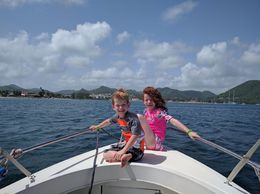 Photo of Kids at the front of the boat Kids chilling out cruising around a bit before going to the beach. , cpick - July 2016
