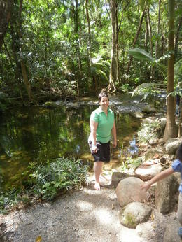 Photo of The little private part of Mossman Gorge we got taken to. Such a privilege to be taken to this little spot with welcoming Aboriginal artifacts and a fire still smoldering. This is me dipping my toe in the fresh cold water. , Laura B - August 2013