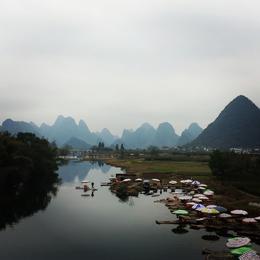 Photo of Beautiful view from Dragon Bridge, Yaoshan (extra activity) Ride on a bamboo raft down this stretch of the river after a tour of Yaoshan Village - 600 years old. , Amy-Claire - March 2014
