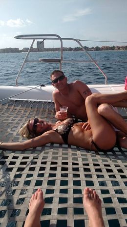 Photo of Sunbathing with my babe Tanning on the front of the boat. , Michelle M - June 2016