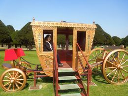 Photo of A carriage fit for a queen Kim Quinn in a royal carriage at Hampton Court Palace's beautiful gardens. , gotroygreg - May 2016