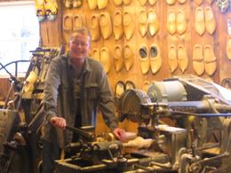 Photo of Wooden Shoes Factory The person is showing how to manufacture wooden shoes, Mahendra C - November 2009