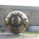 This is a HUGE revolving metal sculpture in the 'pine cone' courtyard of the Vatican. - Photo by: Ann K, United States of America