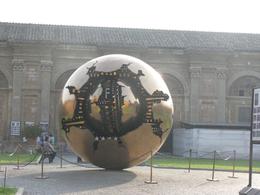 Photo of Vatican sculpture This is a HUGE revolving metal sculpture in the 'pine cone' courtyard of the Vatican., Ann K - October 2009