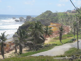 Photo of COAST OF BARBADOS LOOKING AT THIS PART OF THE COAST OF BARBADOS WITH THE UNUSUAL COLOR SAND AND THE HUGE ROCKS REALLY ATTRACT YOUR EYE. , Denis J F - April 2015
