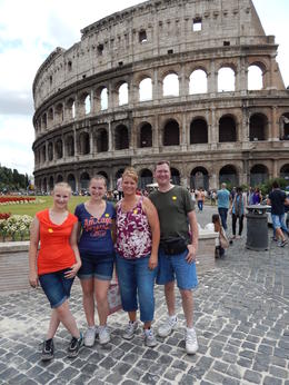 Photo of At the Colosseum in Rome Our family standing on the original cobblestone road just outside the Colosseum. , Andrew G - July 2013