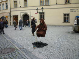 Photo of Old Town Square I still can't figure out how he was keeping himself up like that., Irene - October 2013