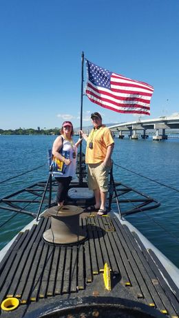 Photo of On the deck of USS Bowfin at Pearl Harbor My son Josh and myself, Paula, are touring the USS Bowfin at Pearl Harbor. We wanted a picture by the beautiful American Flag displayed on the submarine. , Paula P - January 2016