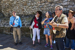 Photo of Pascal speaking to the group in Mont St. Michel Pascal speaking to the group in Mont St. Michel , Newton D - August 2016