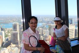 Photo of Enjoying the "Heights" at the Sydney Eye" My mother-in-law and my wife Bonett having a jolly time enjoying Sydney and its surroundings at Sydneys tallest building, the "Sydney Tower". , Pedro L - January 2013