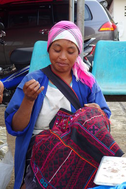 Photo of Hilltribe handicraft A local woman doing embroidery - roadside market in Doi Mae Salong , Darren Meg L - April 2015