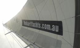 Photo of It's a sail! I believe that the sail is just doing its job here, helping the yacht (and everyone on board) stay upright! :-) , Barbara D - January 2015