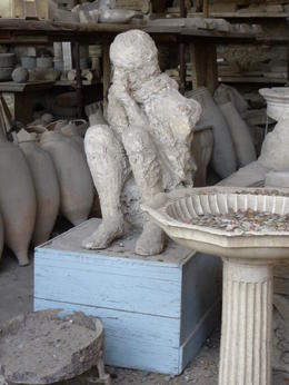Photo of Caught by the Volcanic Ash The body of a man - possibly a thief as he is surrounded by coins - who returned to Pompeii the day after the first eruption and was caught by the second eruption which covered the city in ash and ... , Maria A B - November 2014