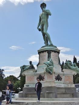 Photo of The bronze replica of David on the hill overlooking Florence My wife dwarfed by the huge David! , Prabir S - June 2013