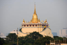 Photo of View of Golden Mount temple from tuk tuk Golden Mount temple (Wat Saket) across the rooftops in Bangkok (view from tuk tuk) - June 2011