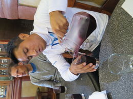 Photo of Sampling the Peruvian drink chica morada. Made from black corn, apple peel, cinnamon and cloves, see Jimmy I was paying attention. , Ann K - July 2016