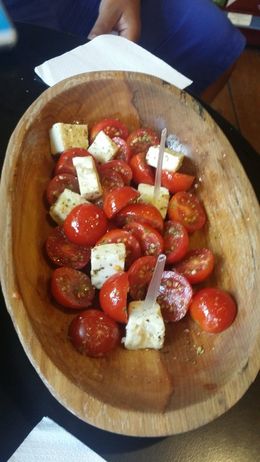 Photo of Greek Salad We tasted Olive Oils and Balsamic Vinegar. Apparently an authentic Greek salad does not contain anything more than vinegar, olive oil, tomatoes, and Feta! , mpower_666 - August 2016