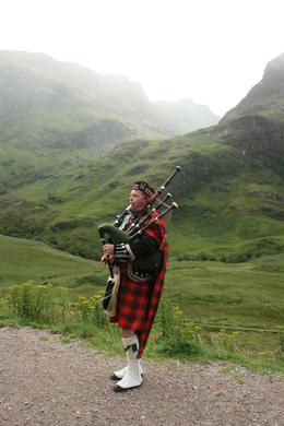 Photo of Bagpipes at Glencoe Here was a bagpiper we saw at the stop in Glencoe. Beautiful memory for us. Marcia Stubbeman photo, Eric S - August 2010