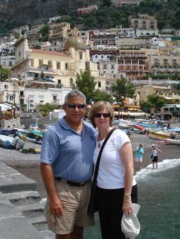 Photo of Waiting for the boat at Amalfi My wife and I pose for a picture while waiting for the boat that will take us along the coastline., David F - July 2008