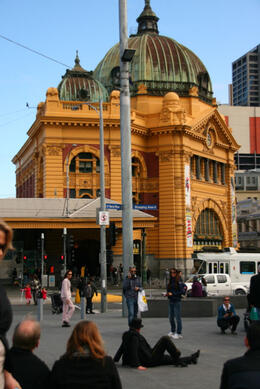 Photo of Flinders Street Station from Fed Square The guy on the gound is a busker who's act was actually pretty funny! He got a huge crowd... , ROD C - September 2012