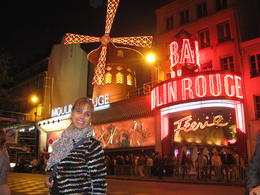 Photo of The Moulin Rouge at night. Do not miss this opportunity to see one of the great spectacles of Paris.The Mouln Rouge. , m f - June 2013