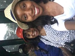 Photo of Me and family as the are riding of the bus We sat at the very back of the bus so we had a great view from the top of the bus. We really enjoyed ourselves and the narrator, scenery, and breeze was a plus. , camille W - June 2016